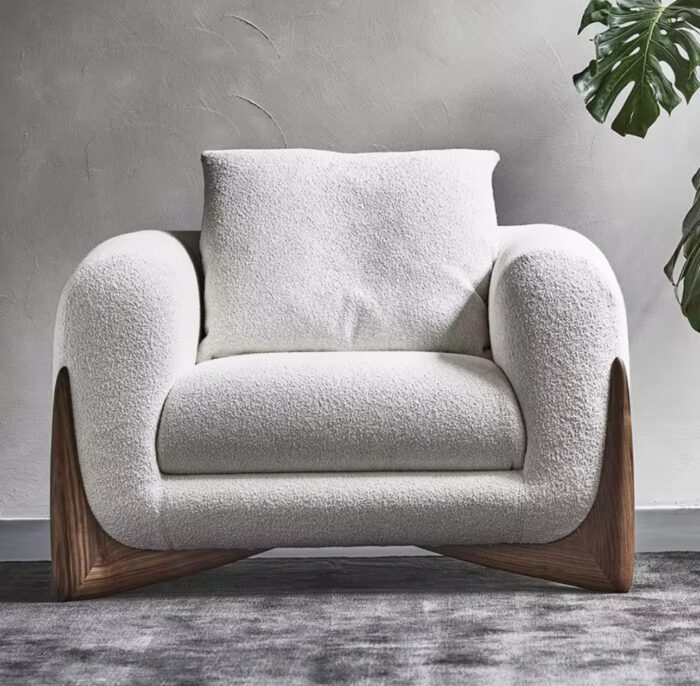 Curved Bouclé Armchair with Wood Base - Image 1